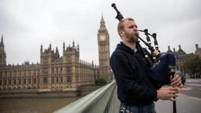 A Scottish piper at Westminster