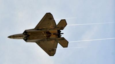 A US F-22 fighter jet takes part in a fly-over in Talladega, Alabama - 23 October 2011