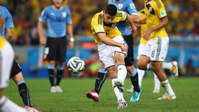 Columbia's James Rodriguez scores a stunning volley against Uruguay during the 2014 World Cup in Brazil