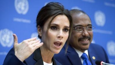 Victoria Beckham speaks alongside Michel Sidibe, Executive Director of Joint UN Program on HIV/AID