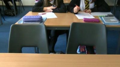 Empty chairs in a classroom