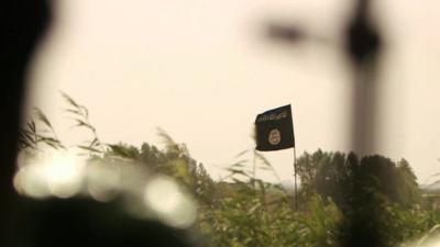 View from Iraqi trench show Islamic State flag