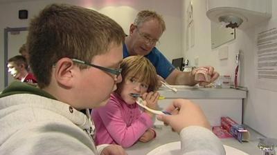 Children brushing their teeth