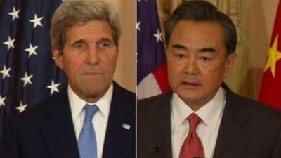 John Kerry and Wang Yi