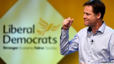 Nick Clegg addresses delegates at an evening rally on 4 October