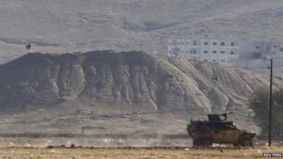 IS flag on hill over Kobane, 6 Oct