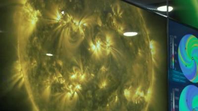 Image of the sun on screen at the new space weather centre