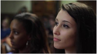 Residents listen at a BBC Pop Up community event in Baton Rouge