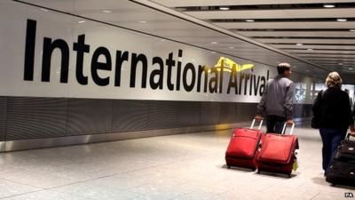 Passengers arrive at Heathrow Airport, London