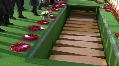 Coffins in grave a Commonwealth War Graves Cemetery in Northern France.