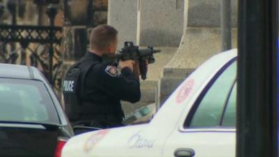 A police officer with a gun