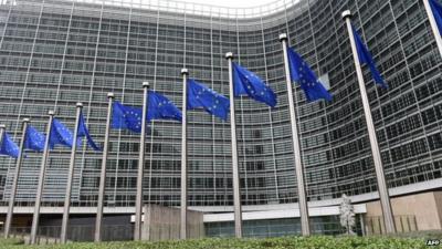 European flags in front of European Commission building