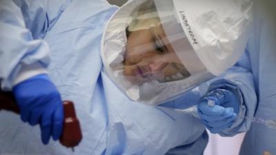 Members of the Department of Defense's Ebola Military Medical Support Team go through special training at San Antonio Military Medical Center, Friday, Oct. 24, 2014