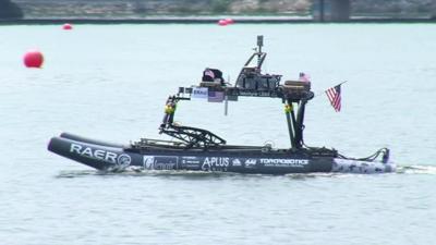 Unmanned boat in water during aquatic robot competition in Singapore