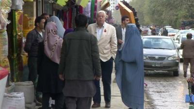 John Simpson on a street in Kabul