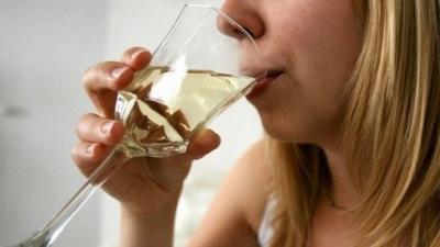 Woman drinking wine