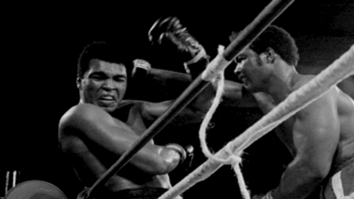 Muhammad Ali and George Foreman contest The Rumble in the Jungle