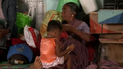 woman and child inside shelter