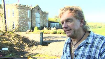 Robert Fidler in front of his castle