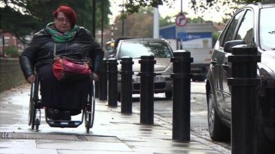 Woman in wheelchair in London