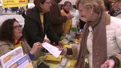 Woman with polling card