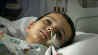 Ashya King in bed in hospital