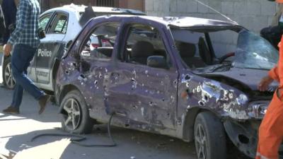 A bomb-wrecked Nissan Micra