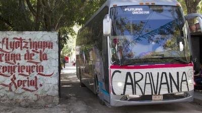 One of the buses embarks on the tour from Ayotzinapa