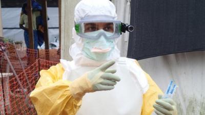 Dr Javid Abdelmoneim in his protective equipment