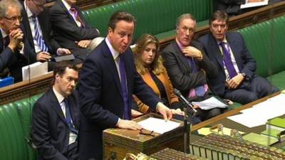 David Cameron talks to MPs