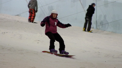 Norma Peace snowboarding on the slopes