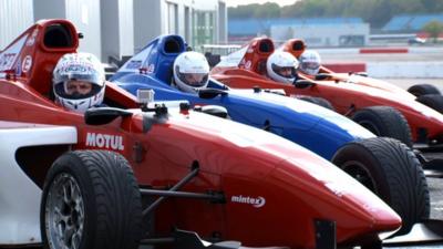 Snooker stars waiting to drive at Silverstone