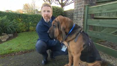 Steve Williams with Hector the bloodhound