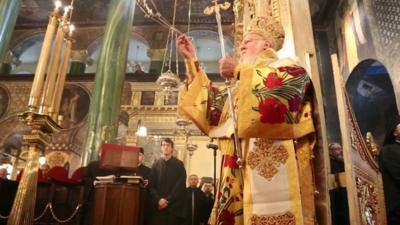 An orthodox priest carrying out a service