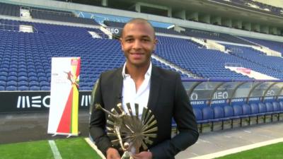 Yacine Brahimi holds his trophy