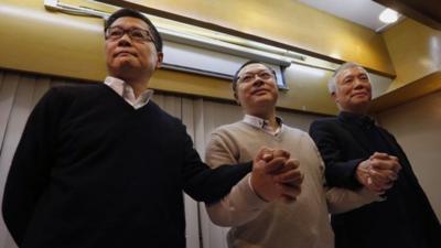 Occupy Central civil disobedience founder Benny Tai (C), with co-founders Chan Kin-man (L), and Reverend Chu Yiu-ming,