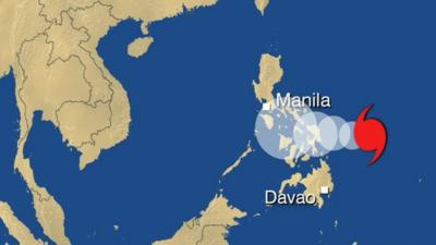 Weather map showing predicted path of Typhoon Hagupit