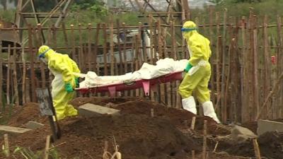 Victims of Ebola are buried