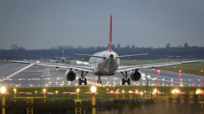 Passenger plane on Gatwick runway in 2013
