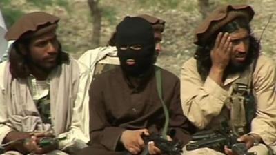 Taliban members with guns