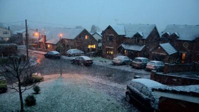 Snowy residential road in north Wales