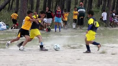 Children playing football