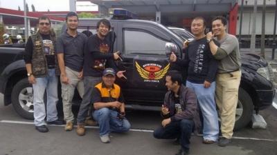 Capt Iriyanto (L) pictured with friends