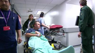 Patient Ricky Groom being wheeled into A&E at Wolverhampton Hospital