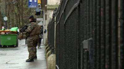 French soldiers outside school