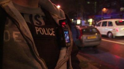 Police officer wearing a body camera