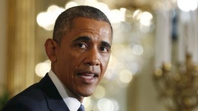 U.S. President Barack Obama answers media questions with British Prime Minister David Cameron