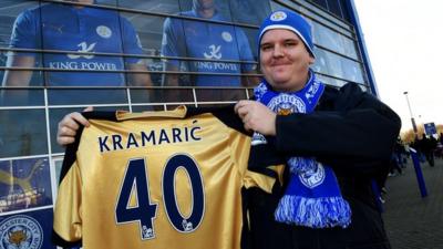 Leicester fan holds up Andrej Kramaric shirt