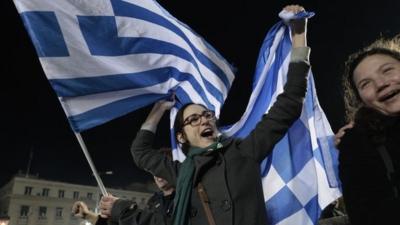 Anti austerity Syriza party supporters celebrate