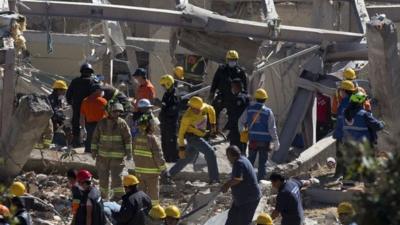 Rescue workers at the scene of the blast